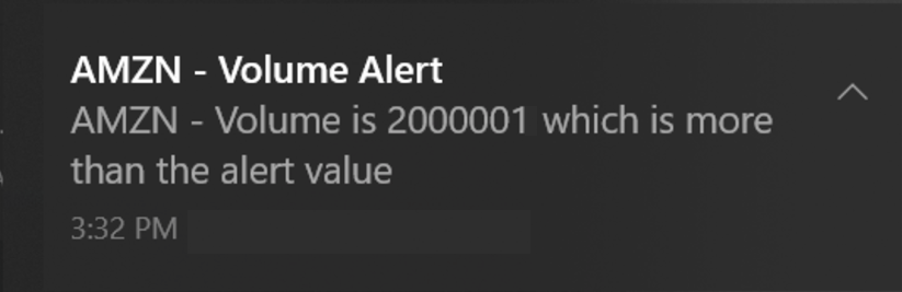 A desktop notification: AMZN Volume Alert — volume is 2000001 which is more than the alert value